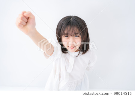 Girl Elementary school student Guts pose Bird's eye view Girl Elementary school student Guts pose Bird's eye view 99014515