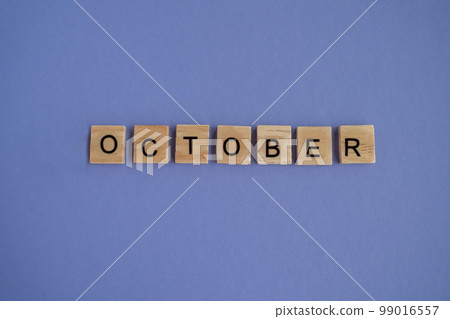 Tenth month of the year October - from isolated letters on wooden blocks in natural color, in high resolution. Very Peri Color of the Year background, copy space. Flat lay, step by step, step 10. Tenth month of the year October - from isolated letters on wooden blocks in natural color, in high resolution. Very Peri Color of the Year background, copy space. Flat lay, step by step, step 10. 99016557