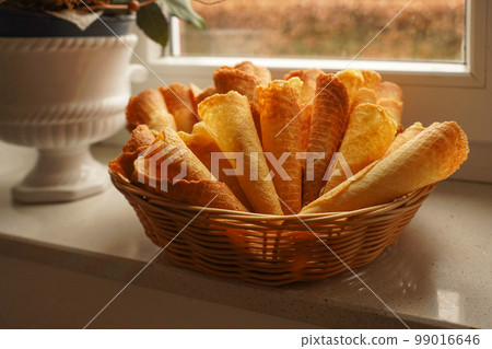 Empty ice cream cones in porcelain bowl 99016646