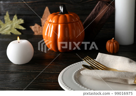 Concept of Thanksgiving day, Autumn table setting on wooden background Concept of Thanksgiving day, Autumn table setting on wooden background 99016975