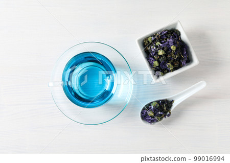 Concept of tasty hot drink, Anchan tea, top view Concept of tasty hot drink, Anchan tea, top view 99016994