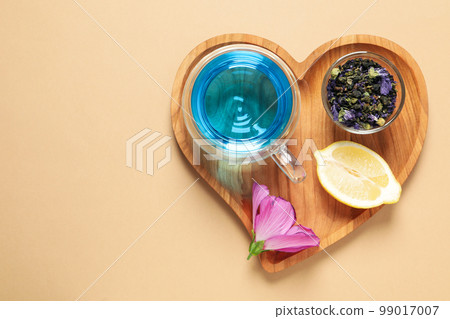 Concept of tasty hot drink, Anchan tea, space for text Concept of tasty hot drink, Anchan tea, space for text 99017007
