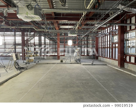 Indoor view of a steel-framed building under construction 99019519