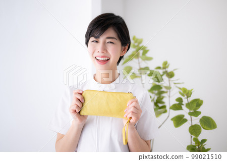 Image of a smiling nurse or caregiver who has successfully changed jobs Image of a smiling nurse or caregiver who has successfully changed jobs 99021510