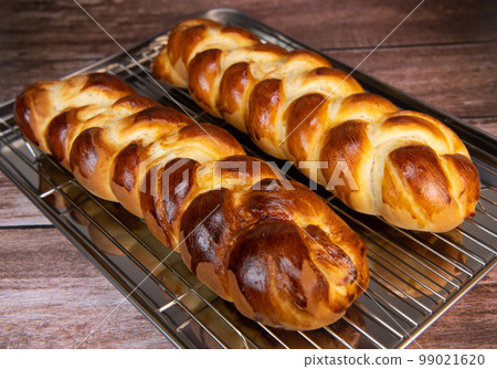 Homemade traditional greek braided brioche Homemade traditional greek braided brioche 99021620