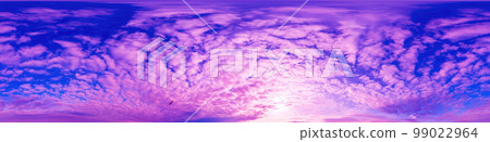 Panorama of a dark blue sunset sky with golden Cumulus clouds. Seamless hdr 360 panorama in spherical equiangular format. Full zenith for 3D visualization, sky replacement for aerial drone panoramas. 99022964