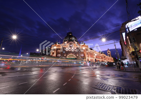 Night view of flinders street station in melbourne australia on a rainy day Night view of flinders street station in melbourne australia on a rainy day 99023479