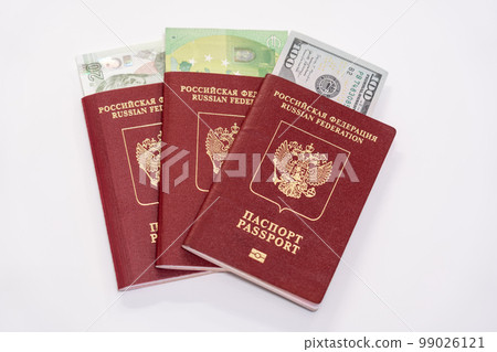 As far as Russian passports with piles of various world currencies nested in them as a symbol of freedom of travel 99026121
