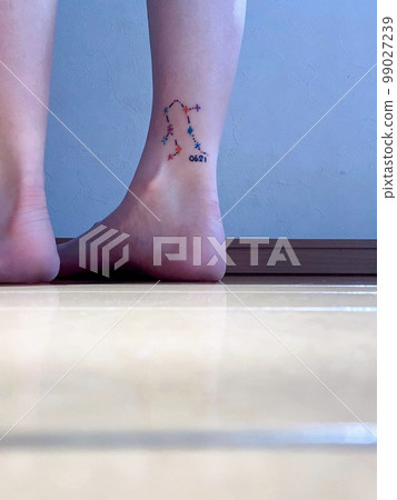 female ankle with tattoo female ankle with tattoo 99027239