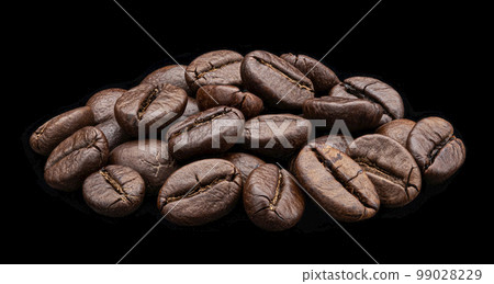 Roasted coffee beans on black background, full depth of field Roasted coffee beans on black background, full depth of field 99028229