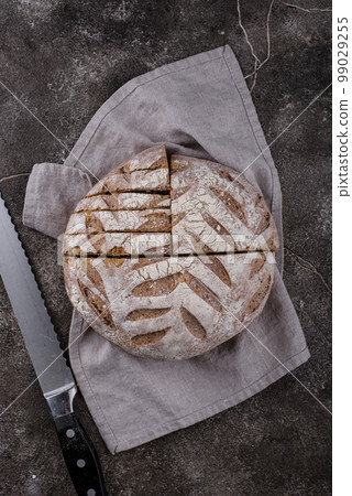 Fresh homemade bread with a crispy crust 99029255