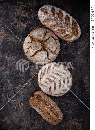 Fresh homemade bread with a crispy crust 99029264