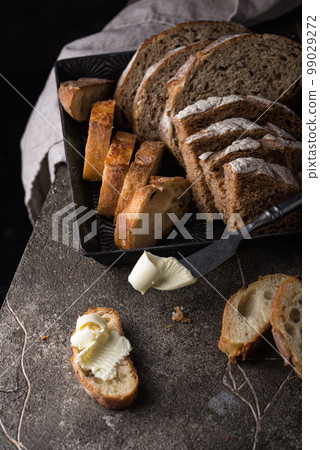 Fresh homemade bread with a crispy crust 99029272