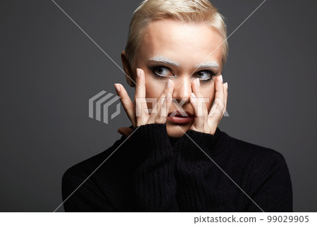 portrait of Short Hair Beautiful young woman with white snow brows 99029905