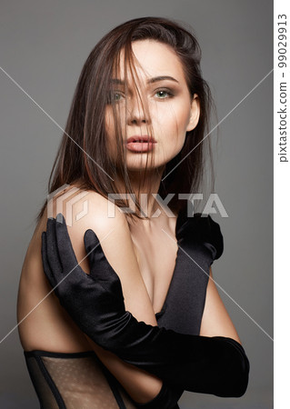 Girl in gloves and underwear. sexy Beautiful young Woman Girl in gloves and underwear. sexy Beautiful young Woman 99029913