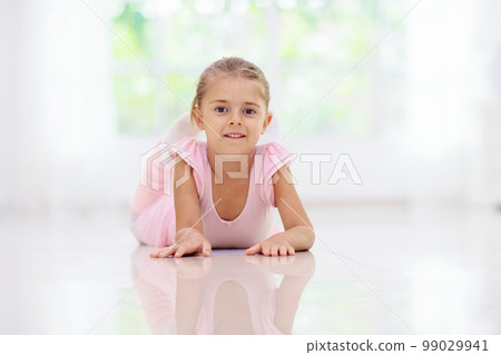 Baby ballet. Little ballerina girl in dance class. 99029941