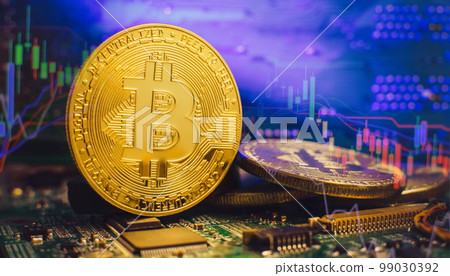 Golden cryptocurrencies Bitcoin golden coin on computer circuit board. banner copy space Golden cryptocurrencies Bitcoin golden coin on computer circuit board. banner copy space 99030392