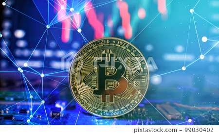 Cryptocurrency concept , Golden bitcoin on mainboard , The future of money. Computational equipment. 99030402