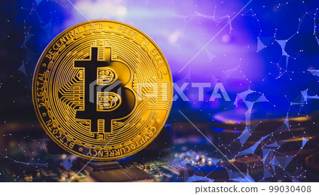 Cryptocurrency concept , Golden bitcoin on mainboard , The future of money. Computational equipment. 99030408