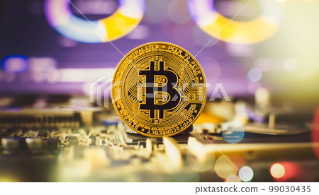 Bitcoin cryptocurrency new version on computer electronic circuit board background . Virtual cryptocurrency money Bitcoin golden Bitcoin cryptocurrency new version on computer electronic circuit board background . Virtual cryptocurrency money Bitcoin golden 99030435
