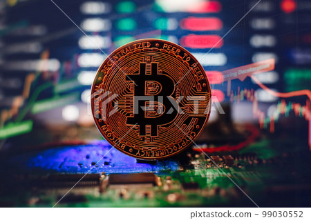 Golden cryptocurrencies Bitcoin golden coin on computer circuit board. banner copy space Golden cryptocurrencies Bitcoin golden coin on computer circuit board. banner copy space 99030552