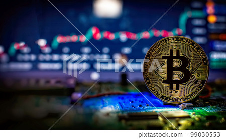 Blockchain technology bitcoin mining concept. Bitcoin golden coin on computer circuit board. banner copy space Blockchain technology bitcoin mining concept. Bitcoin golden coin on computer circuit board. banner copy space 99030553