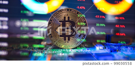 Cryptocurrency concept , Golden bitcoin on mainboard , The future of money. Computational equipment. Cryptocurrency concept , Golden bitcoin on mainboard , The future of money. Computational equipment. 99030558