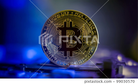 Bitcoin cryptocurrency new version on computer electronic circuit board background . Virtual cryptocurrency money Bitcoin golden 99030570