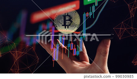 Cryptocurrency and investment. Businessman using tablet to connected on global network and gold bitcoin coin and growth of business graph, Financial, Stock market, Cryptocurrency and investment. Businessman using tablet to connected on global network and gold bitcoin coin and growth of business graph, Financial, Stock market, 99030985