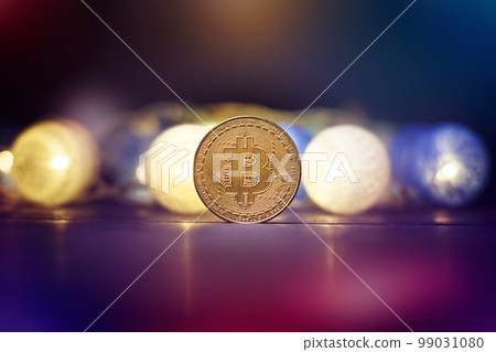 Bitcoin Stock Growth. Chart shows a strong increase in the price of bitcoin. Bitcoin gold coin and defocused chart background. Virtual cryptocurrency concept. Bitcoin Stock Growth. Chart shows a strong increase in the price of bitcoin. Bitcoin gold coin and defocused chart background. Virtual cryptocurrency concept. 99031080
