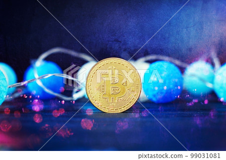 Bitcoin Stock Growth. Chart shows a strong increase in the price of bitcoin. Bitcoin gold coin and defocused chart background. Virtual cryptocurrency concept. Bitcoin Stock Growth. Chart shows a strong increase in the price of bitcoin. Bitcoin gold coin and defocused chart background. Virtual cryptocurrency concept. 99031081