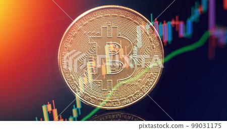 Gold bitcoins with Candle stick graph chart and digital background.Golden coin with icon letter B.Mining or blockchain technology Gold bitcoins with Candle stick graph chart and digital background.Golden coin with icon letter B.Mining or blockchain technology 99031175