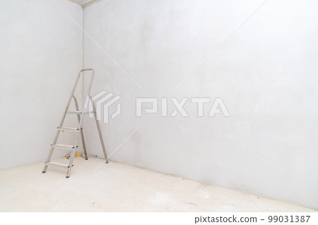 folding ladder on construction site folding ladder on construction site 99031387