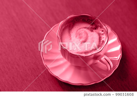 coffee in a pink cup, toned in pink coffee in a pink cup, toned in pink 99031608
