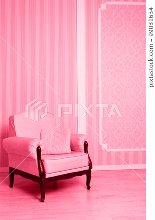 Vintage armchair in the interior, toned in pink Vintage armchair in the interior, toned in pink 99031634