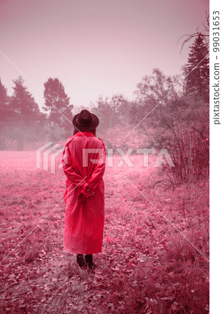 Girl in vintage pink coat and hat, toned in pink Girl in vintage pink coat and hat, toned in pink 99031653