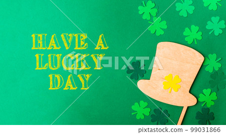 St. Patrick's Day greeting card with clover and leprechaun hat St. Patrick's Day greeting card with clover and leprechaun hat 99031866