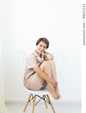 Woman wears pajama copy space. Close-up detail and fabric texture of a pajama. Homewear, sleepwear, shopping and sale Woman wears pajama copy space. Close-up detail and fabric texture of a pajama. Homewear, sleepwear, shopping and sale 99032224