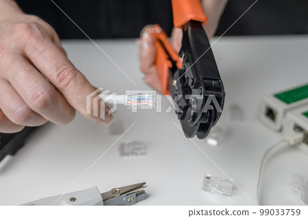 cable twisting tool UTP Cat 5 ethernet twisted pair, connecting procedure UTP cable,  RJ45 LAN cable crimping, going to RJ45 connector crimping. 99033759