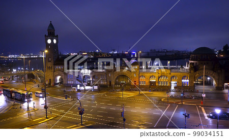 Famous St Pauli Landungsbruecken at the port of Hamburg - amazing evening view 99034151