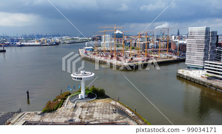 Aerial view over modern Harbour City district in Hamburg at the port 99034171