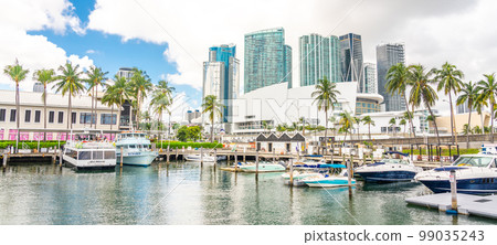 View of the Marina in Miami Bayside with modern buildings and skyline in the background. View of the Marina in Miami Bayside with modern buildings and skyline in the background. 99035243