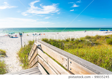 Indian rocks beach with green grass in Florida, USA Indian rocks beach with green grass in Florida, USA 99035245