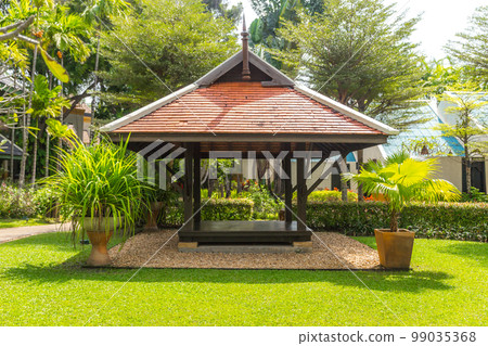 beautiful wooden gazebo and nice green lawn beautiful wooden gazebo and nice green lawn 99035368