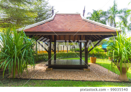 beautiful wooden gazebo in real tropical nature 99035540