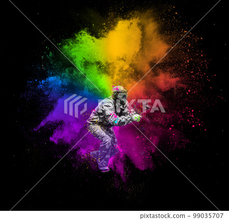 paintball sport player in protective uniform and mask, digital art collage 99035707