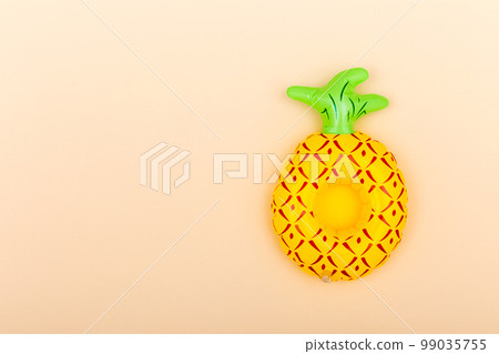 Inflatable cup holder on an orange background with copy space Inflatable cup holder on an orange background with copy space 99035755