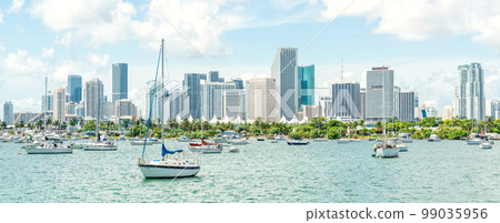 Miami skyline with yachts, boats and skyscrapers 99035956