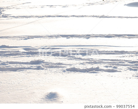 deep trail in the snow. sunny day. deep trail in the snow. sunny day. 99037554