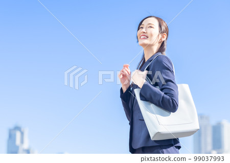 Career woman working towards a bright future 99037993